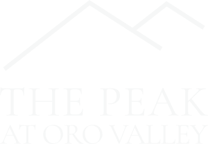 A black and white image of a mountain range with the words "The Peak at Oro Valley" written below it.